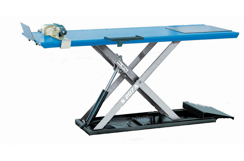 Hydraulic scissor lift developed for the professionals of 2 - 3 - 4 wheelers.